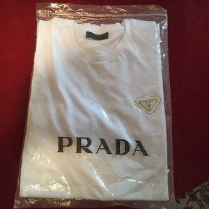 Prada Logo Tee-shirt. White. 2XL but fits like XL. Rear pocket with zipper. New.